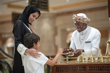 Traditional dates offered to guests from a hospitality cart